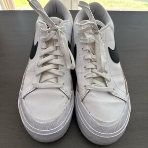 Nike Women's White Sneakers with Black Swoosh